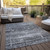 10' X 14' Black Gray And Charcoal Abstract Washable Indoor Outdoor Area Rug