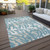 8' X 10' Teal Blue Beige And Ivory Animal Print Washable Indoor Outdoor Area Rug
