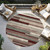 8' Merlot Burgundy And Beige Round Striped Washable Indoor Outdoor Area Rug