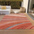 10' X 14' Terra Cotta Salmon And Orange Striped Washable Indoor Outdoor Area Rug