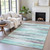 8' X 10' Teal Blue Plum And Ivory Striped Washable Indoor Outdoor Area Rug