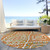 8' Orange Peach And Ivory Round Floral Washable Indoor Outdoor Area Rug