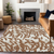 8' X 10' Brown Beige And Ivory Animal Print Washable Indoor Outdoor Area Rug