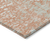 9' X 12' Coral And Ivory Abstract Washable Indoor Outdoor Area Rug