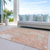 9' X 12' Coral And Ivory Abstract Washable Indoor Outdoor Area Rug