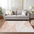 9' X 12' Salmon Peach And Ivory Abstract Washable Indoor Outdoor Area Rug