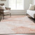 9' X 12' Salmon Peach And Ivory Abstract Washable Indoor Outdoor Area Rug