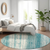 8' Teal Blue And Ivory Round Striped Washable Indoor Outdoor Area Rug