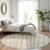 8' Ivory And Beige Round Abstract Washable Indoor Outdoor Area Rug