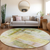 8' Green Yellow And Purple Round Abstract Washable Indoor Outdoor Area Rug
