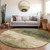 8' Fern Green And Beige Round Abstract Washable Indoor Outdoor Area Rug