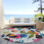 8' Ivory Pink Orange And Blue Round Floral Washable Indoor Outdoor Area Rug