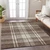 9' X 12' Brown Black And Ivory Plaid Washable Indoor Outdoor Area Rug