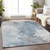9' X 12' Sky Blue Gray And Ivory Abstract Washable Indoor Outdoor Area Rug