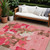 8' X 10' Coral Pink And Brown Abstract Washable Indoor Outdoor Area Rug