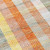 8' Peach Ivory And Orange Round Plaid Washable Indoor Outdoor Area Rug