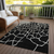 8' X 10' Black And Beige Abstract Washable Indoor Outdoor Area Rug
