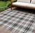 10' X 14' Black Ivory And Red Plaid Washable Indoor Outdoor Area Rug