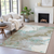 9' X 12' Teal Blue And Brown Abstract Washable Indoor Outdoor Area Rug