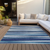 9' X 12' Navy Blue Ivory And Gray Striped Washable Indoor Outdoor Area Rug