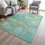9' X 12' Teal Blue Mint Green And Ivory Abstract Washable Indoor Outdoor Area Rug