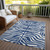 9' X 12' Navy Blue And Ivory Animal Print Washable Indoor Outdoor Area Rug
