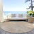 8' Coral And Salmon Round Abstract Washable Indoor Outdoor Area Rug