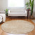 8' Coral And Salmon Round Abstract Washable Indoor Outdoor Area Rug