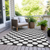 10' X 14' Black And Ivory Polka Dot Washable Indoor Outdoor Area Rug