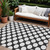 10' X 14' Black And Ivory Polka Dot Washable Indoor Outdoor Area Rug