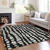 9' X 12' Black And Ivory Abstract Washable Indoor Outdoor Area Rug