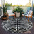 8' Black And Ivory Round Animal Print Washable Indoor Outdoor Area Rug