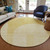 8' Gold Ivory And Yellow Round Geometric Washable Indoor Outdoor Area Rug