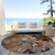 8' X 8' Chocolate Terracotta and Ivory Round Abstract Washable Indoor Outdoor Area Rug