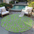 8' Lime Green And Purple Round Geometric Washable Indoor Outdoor Area Rug