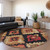 8' Rust And Charcoal Round Aztec Washable Indoor Outdoor Area Rug