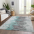 8' X 10' Teal Blue Charcoal And Silver Abstract Washable Indoor Outdoor Area Rug