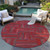 8' Red And Brown Round Geometric Washable Indoor Outdoor Area Rug