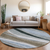 8' Brown Blue And Gray Round Abstract Washable Indoor Outdoor Area Rug