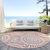8' Coral And Ivory Round Geometric Washable Indoor Outdoor Area Rug