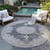 8' Black And Ivory Round Oriental Washable Indoor Outdoor Area Rug