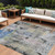 9' X 12' Blue Black And Copper Abstract Washable Indoor Outdoor Area Rug