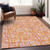 8' X 10' Orange Pink And Beige Abstract Washable Indoor Outdoor Area Rug