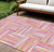 10' X 14' Blush Ivory And Orange Geometric Washable Indoor Outdoor Area Rug