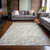9' X 12' Beige and Ivory Abstract Washable Non Skid Indoor Outdoor Area Rug