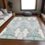 10' X 14' Mint Green Teal Blue And Ivory Ikat Washable Indoor Outdoor Area Rug