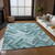 10' X 14' Teal Blue Aqua And Ivory Geometric Washable Indoor Outdoor Area Rug