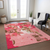 9' X 12' Coral Pink And Brown Abstract Washable Indoor Outdoor Area Rug