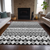 8' X 10' Black Gray And Ivory Quatrefoil Washable Indoor Outdoor Area Rug