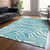 9' X 12' Teal Blue And Ivory Animal Print Washable Indoor Outdoor Area Rug